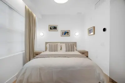 a white bedroom with a large bed in it at Vonder Miami Beach - Unit 18 in Miami Beach