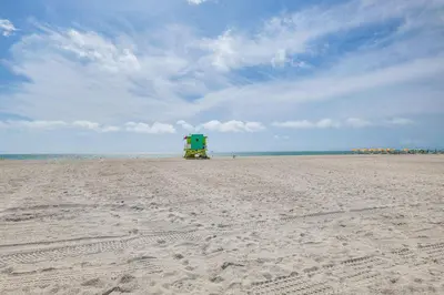 a truck is parked on the beach at Cozy Miami Beach Apartment Less Than 1 Mi to Ocean! in Miami Beach
