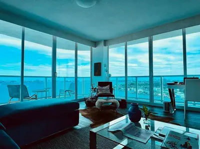 a living room with a view of a city at North Bay Village - perfect view in Miami Beach