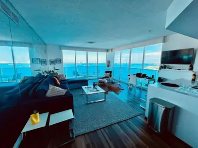 a living room with a view of the ocean at North Bay Village - perfect view in Miami Beach