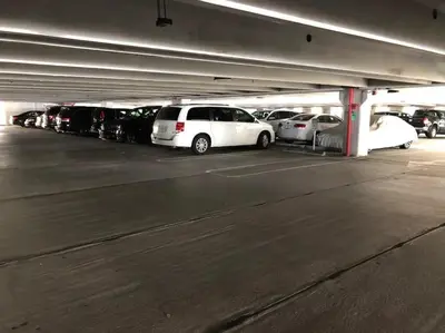 a group of cars parked in a parking garage at Luxe Hollywood Beachfront Condo in Hollywood