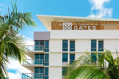 a building with a sign that reads cats at The Gates Hotel South Beach in Miami Beach