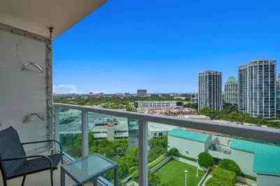 a balcony with a chair and a view of the city at 2bedroom City Ocean Treasure in Miami
