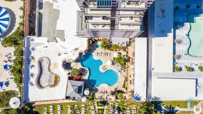 an overhead view of a resort with a swimming pool at Beautiful 2 Br Apartment Amazing Pool in Miami Beach