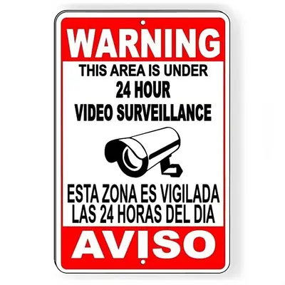 a sign that readswarning this area is under hour video surveillance at Coco Sol 1 by MyMiamiStay in Miami