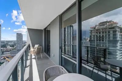 a balcony with a view of a city at New Luxury Apartment at Downtown Miami in Miami