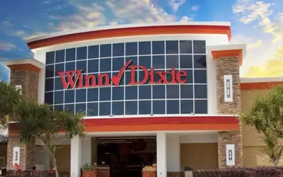 a winnie dixie building with a sign on it at Cordova Arms By Rocketstay in Fort Lauderdale