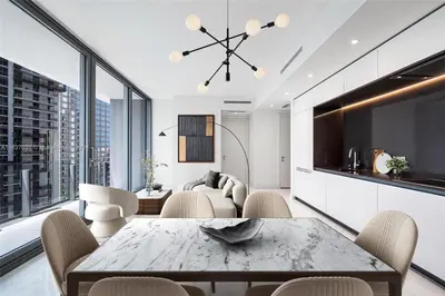 a living room with a couch and a table at ASTON MARTIN TOWER Miami in Miami