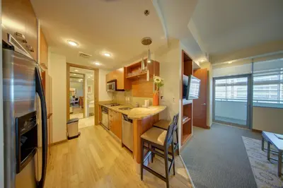a kitchen with a sink and a counter top at Brickell High Floor AKA Free Parking by Palermo Home Miami in Miami