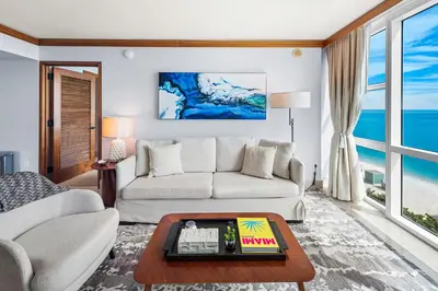 a living room with a couch and a table at 2 Bedroom Private Residence at Carillon Miami Resort -522 in Miami Beach
