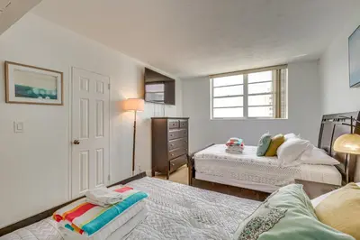 a bedroom with two beds and a window at Hollywood Condo with Beach Access - Walk to Shore! in Hollywood