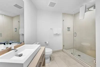 a bathroom with a sink and a toilet and a shower at Breathtaking Ocean-View Balcony Lyfe Resort in Hollywood Beach