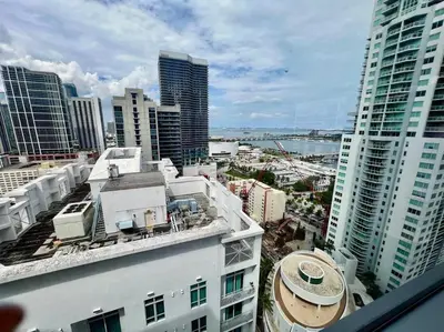 an aerial view of a city with tall buildings at Spacious Studio in the Heart of Downtown Miami in Miami