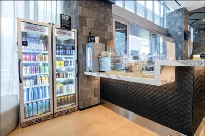 a grocery store with two refrigerators and drinks at Spacious Studio in the Heart of Downtown Miami in Miami