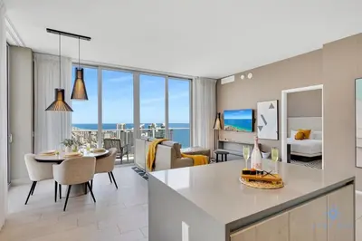 a kitchen and living room with a view of the ocean at Penthouse with Free Parking and Beautiful Amenities in Hollywood