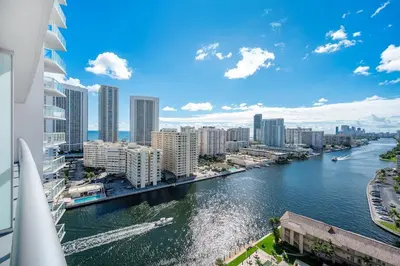 a view of a river in a city with buildings at Beachwalk Family Studio- Beach Pool Gym & Bay View in Hallandale Beach