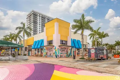 a building with a colorful mural on the side of it at Luxury apartment in Doral miami, 1 Bd in Miami