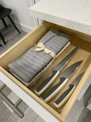 a tray with three knives and a counter top at Newly renovated studio close to the beach in Hollywood