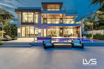 an image of a house with a swimming pool at Carlotta- New Construction Luxury Waterfront Villa in Fort Lauderdale