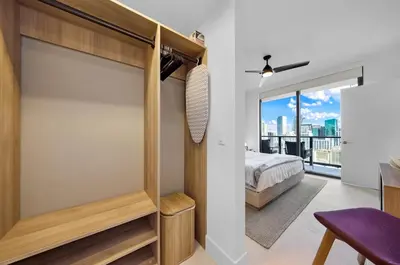 a bedroom with a bed and a large window at Upscale 1-BD Condo with Stunning City Views in Miami