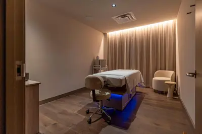 a hospital room with a bed and a chair at Orange Crush - Resort-Style Amenities & Location in Miami