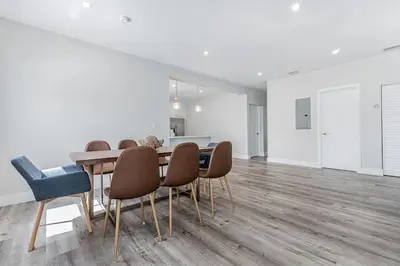 a dining room with a table and chairs at Modern Miami Unit 1 - Close to South Beach & Airport in Miami
