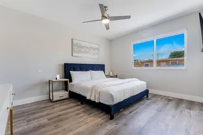a bedroom with a bed and a ceiling fan at Modern Miami Unit 1 - Close to South Beach & Airport in Miami
