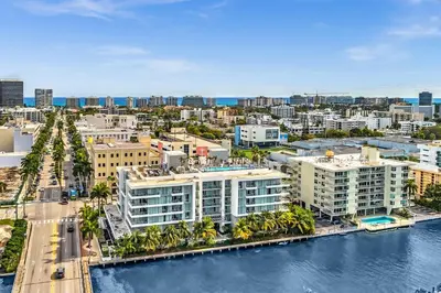 an aerial view of a city with a river and buildings at Grand Deluxe Two Bedroom Suite with Balcony Water Views, Corner in Miami Beach