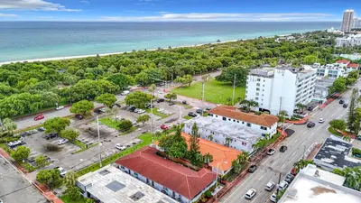 an aerial view of a city with the ocean at Los Patios Home Suites in Miami Beach