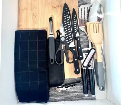 a group of kitchen utensils on a cutting board at 1100 West South Beach Lux Waterfront Studio in Miami Beach