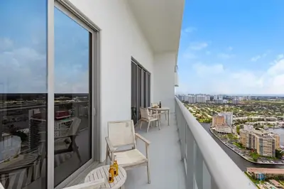 a balcony with a view of a city at 1 BR Apartment with Bay View and Parking Included in Hollywood