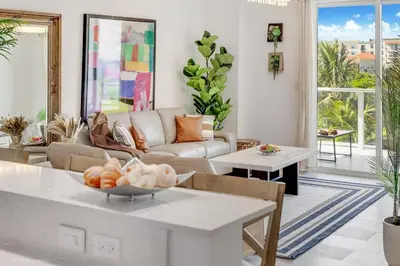 a living room with a couch and a table at Lux 3BR City-View Retreat in Hollywood, 5th Floor in Hollywood