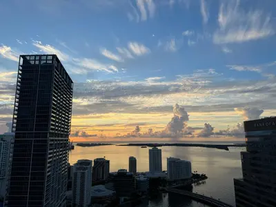 a view of a city skyline with a river and buildings at Brickell city center in Miami