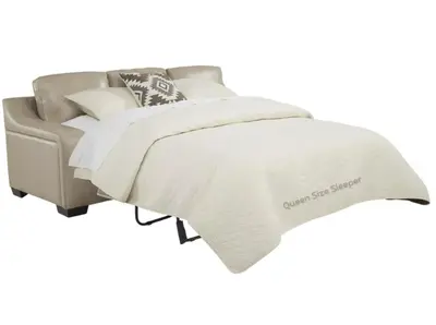 a bed with a white comforter and a couch at Lux 3BR City-View Retreat in Hollywood, 3rd Floor in Hollywood