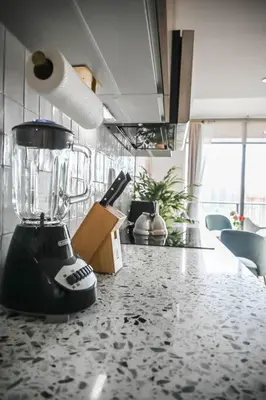 a blender sitting on a counter in a kitchen at Miami Luxury 27th Floor, Best Waterfront Balcony View & City Lights, Pool,Gym,Spa in Miami