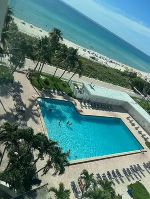 an overhead view of a swimming pool next to the beach at Casablanca miami beach in Miami Beach