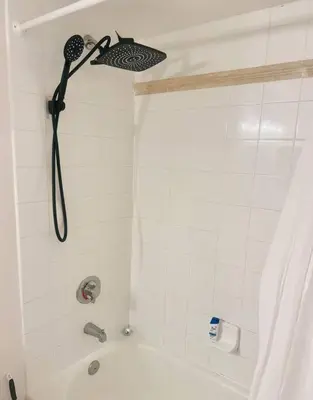 a shower with a blow dryer in a bathroom at 36th-Floor Ocean View Brickell - Free Parking in Miami
