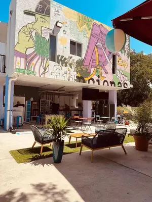 a building with a painting on the side of it at Miami Design District in Miami