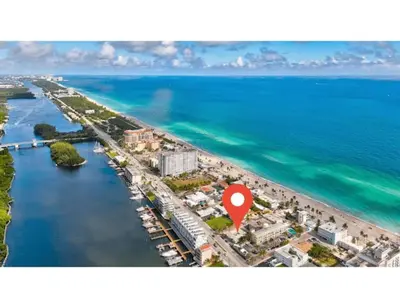 an aerial view of a beach with a red marker at Sun kissed Charm Beachside Hollywood Studio in Hollywood
