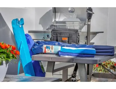 a table with a blue blanket on top of it at Sun kissed Charm Beachside Hollywood Studio in Hollywood