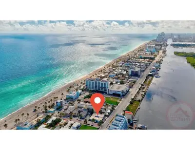 an aerial view of a beach with a red marker at Studio Oasis near Hollywood Boardwalk in Hollywood