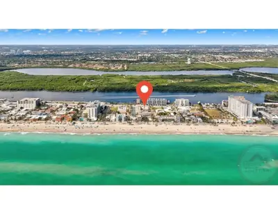 an aerial view of a beach with a red marker at Beachside Bliss Hollywood Studio in Hollywood