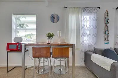 a living room with a table and a couch at 3 Mi to Beach Quaint Home with Patio in Hollywood in Hollywood