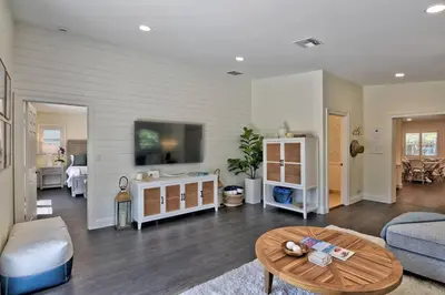a living room with a couch and a table at Gorgeous Las Olas - Heated Pool, Close to Beach in Fort Lauderdale