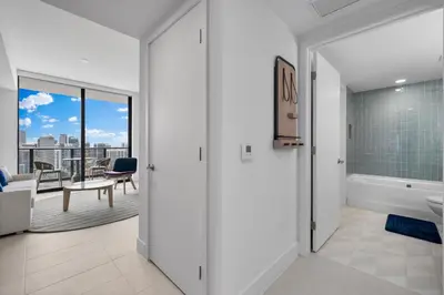 a bathroom with a tub and a sink at Luxury Panoramic Views - The Ultimate Downtown Getaway in Miami