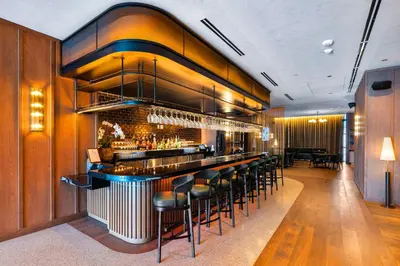 a bar in a restaurant with stools at PH 49 Floor Luxury Studio w Free Parking in Miami