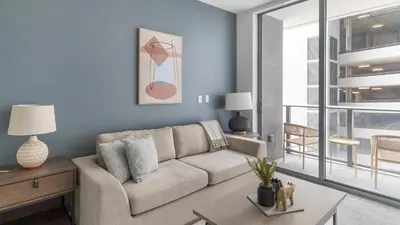 a living room with a couch and a table at The Bayfront VIII in Miami
