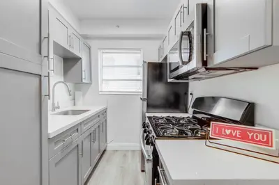 a kitchen with a i love you sign on the counter at Easy Ocean Dr Beach, 2 Queenbeds in Miami Beach