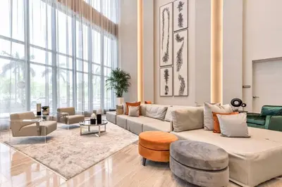 a living room with a couch and a table at Wonderful 2 bedroom Apartment in Downtown Doral in Miami