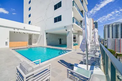 a swimming pool on the roof of a building at Private Terrace in Luxury 3BR Condo in Brickell in Miami